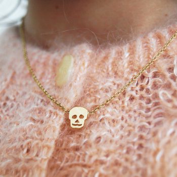 Gold Skull necklace WEARING